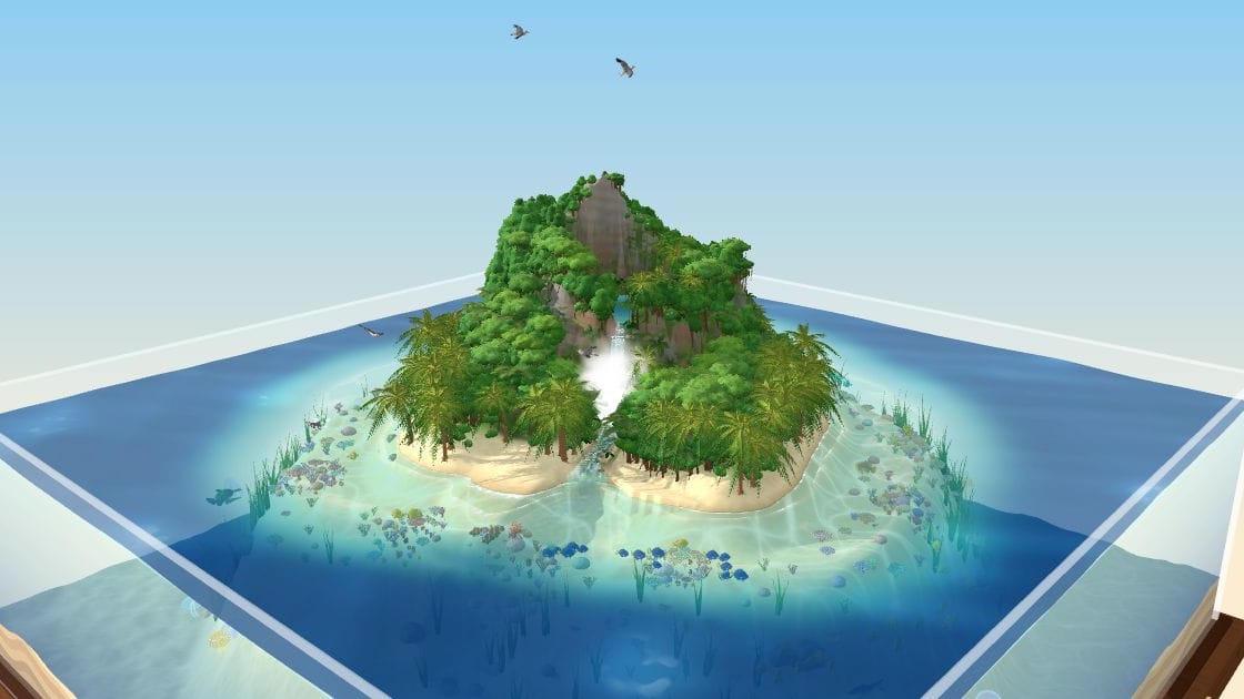 A miniature tropical island with a waterfall, palm trees and a coral reef in a glass tank